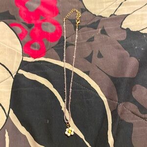 Purple flower beaded necklace.
